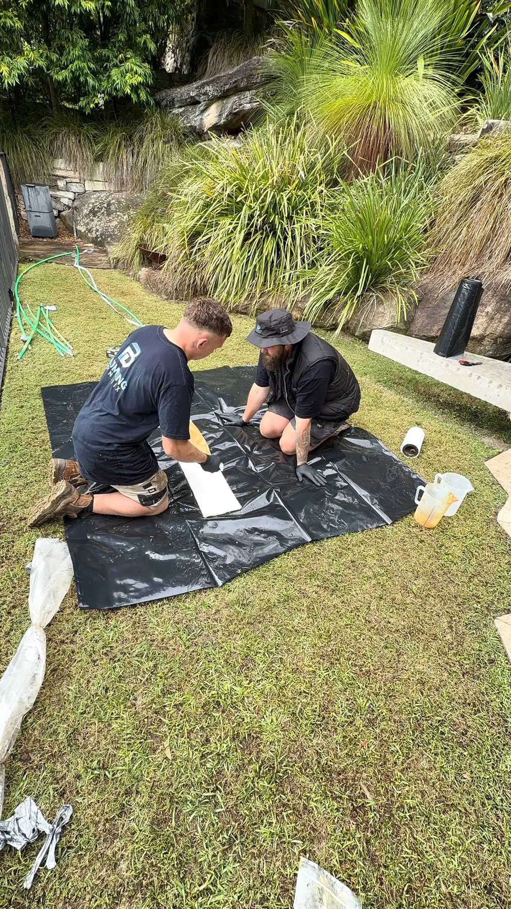 Pipe relining team at work by Plumbing Dynamix